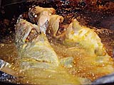 Catfish frying in the wok