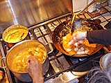 Adding fresh scallops after reducing the sauce