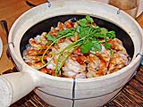 Clay pot finished with a cilantro garnish