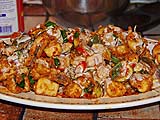 Sturgeon drizzled with warmed coconut cream