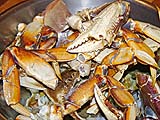 Raw Dungeness crab pieces w/cracked shells