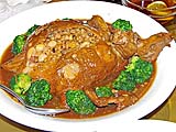 Stuffed duck filled with barley, roasted chestnuts, ham, etc.